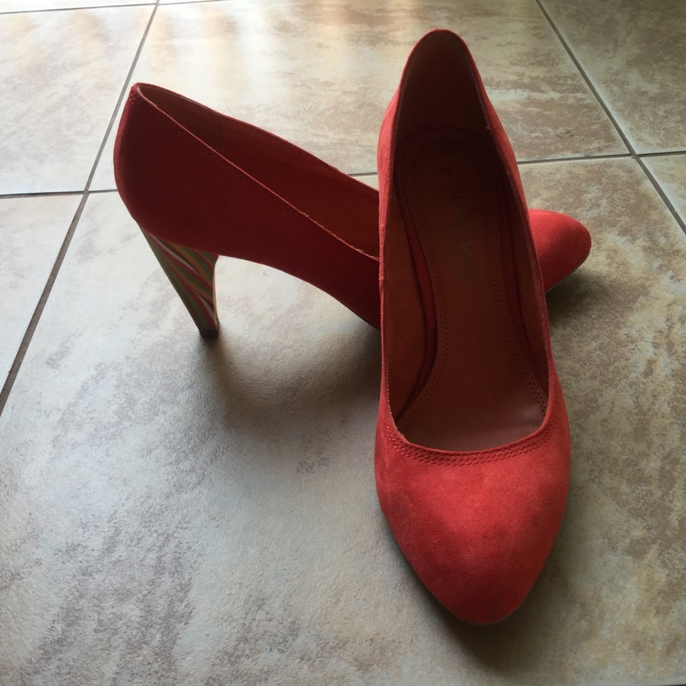 Orange suede pumps